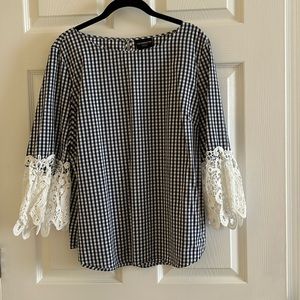 Blue and white blouse with lace sleeves